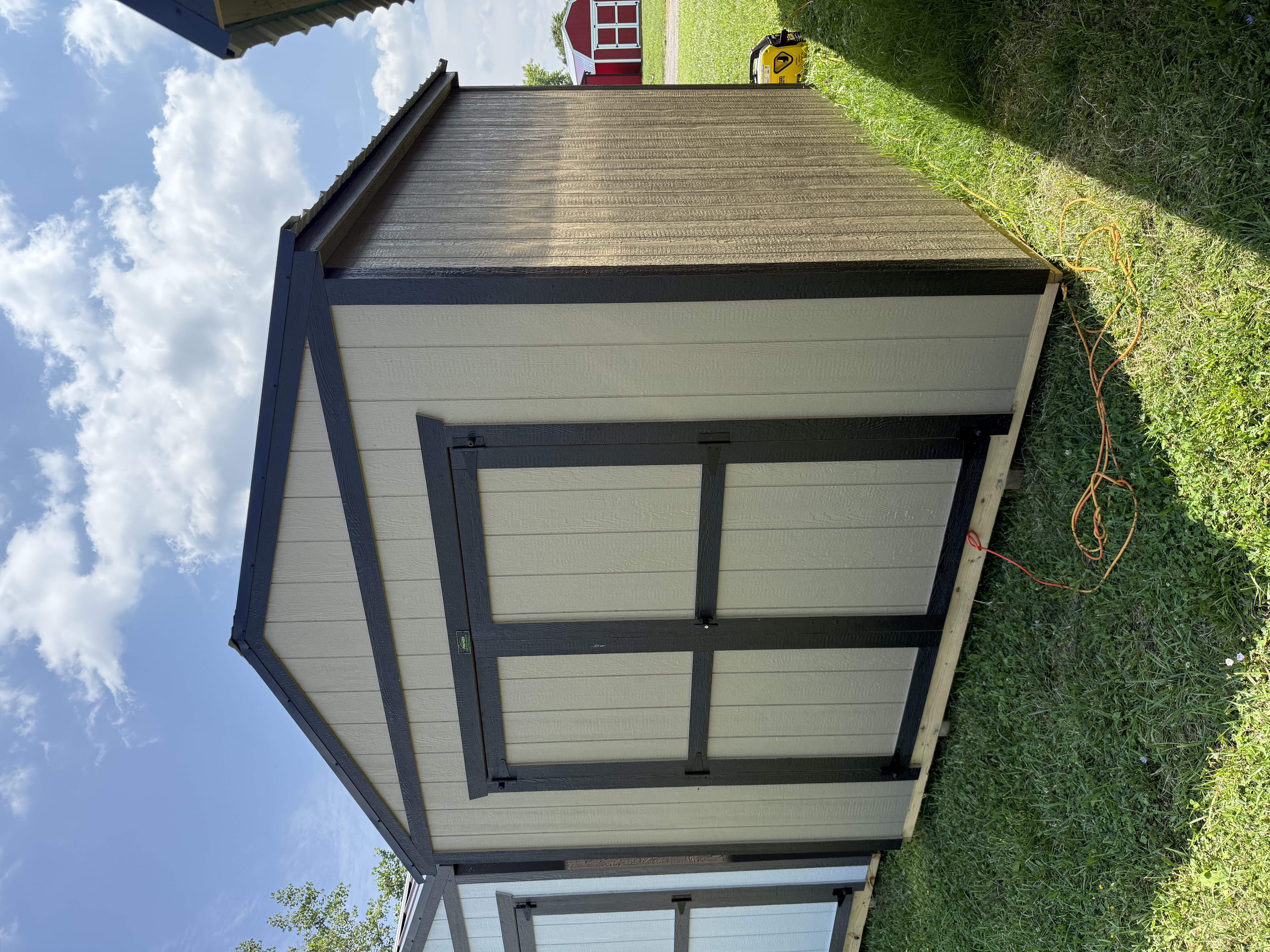 Lineup of Premier Portable Buildings on the Lorain sales lot
