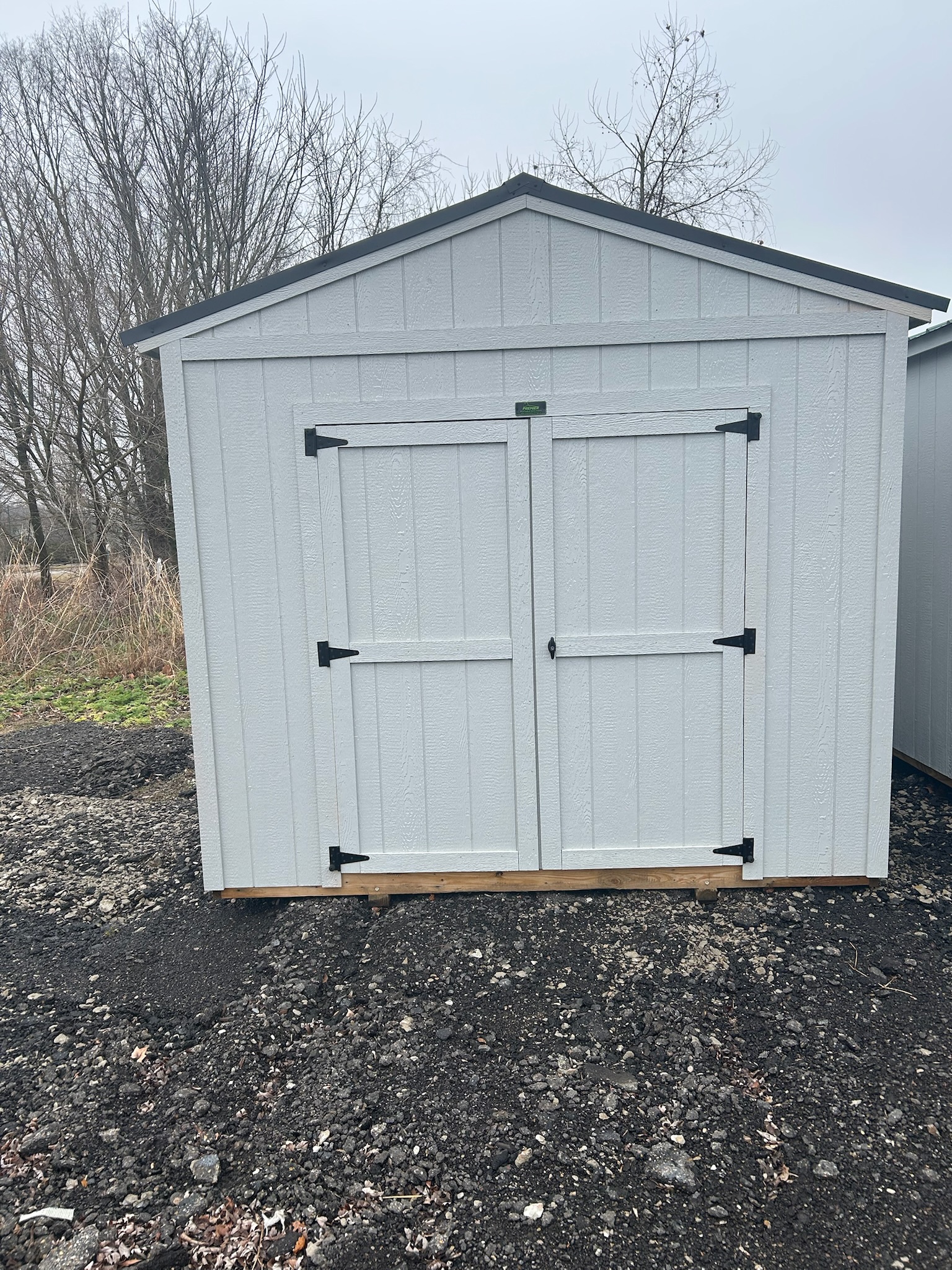 Lineup of Premier Portable Buildings on the Newark sales lot